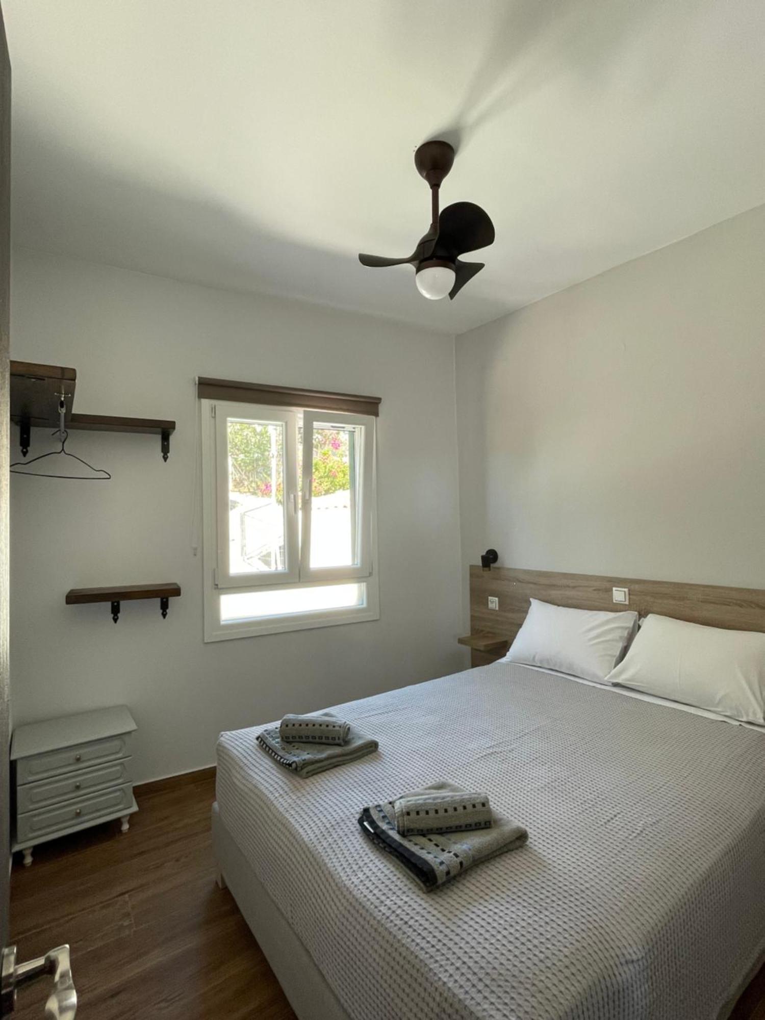 Q Apartments Molyvos Митимна Экстерьер фото