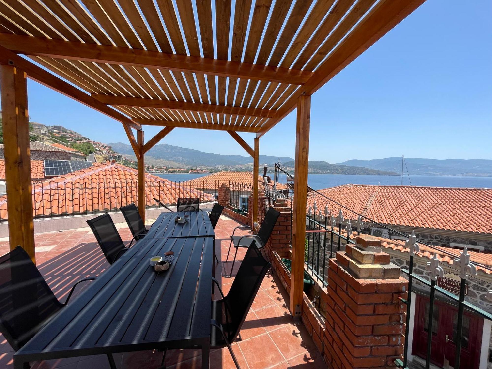 Q Apartments Molyvos Митимна Экстерьер фото
